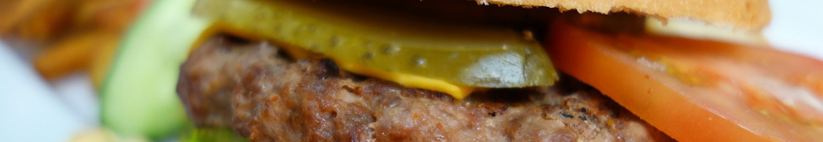 Eating American (Traditional) Burger at Becks Prime restaurant in Houston, TX.